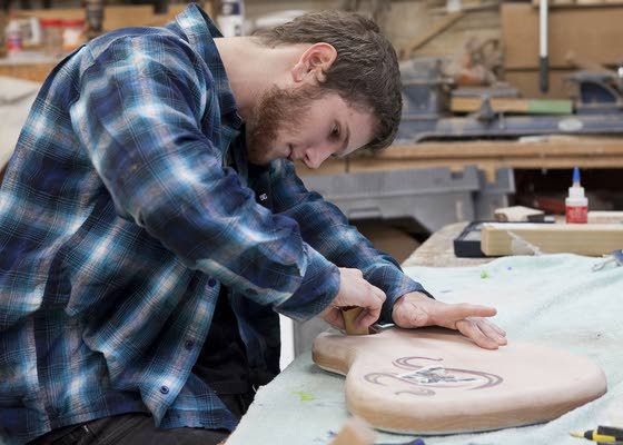 Stockton grad teaching himself to make guitars in Pleasantville to earn a living